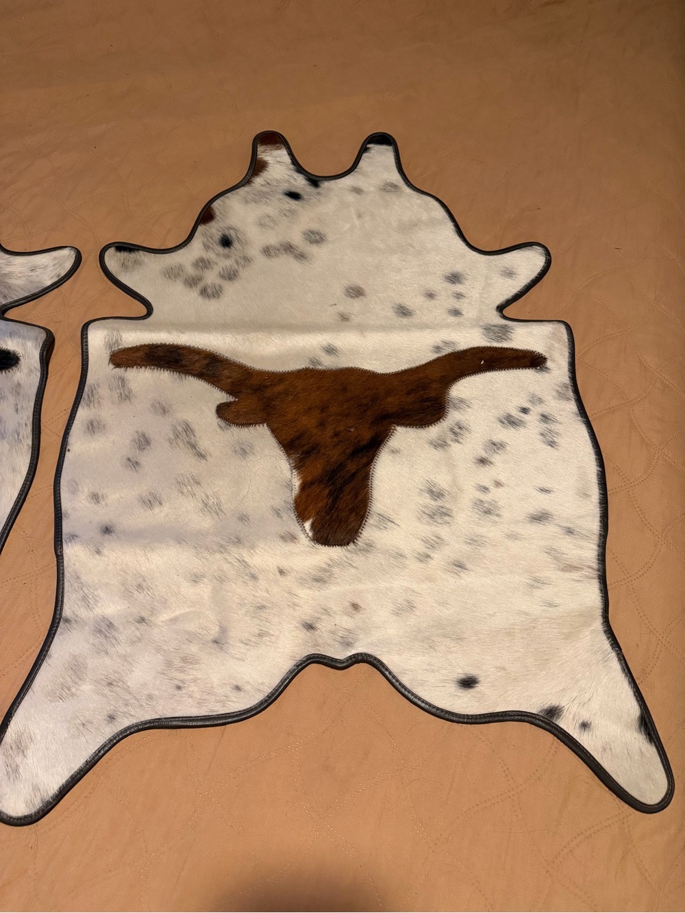 Pair of Small Cowhide Rugs